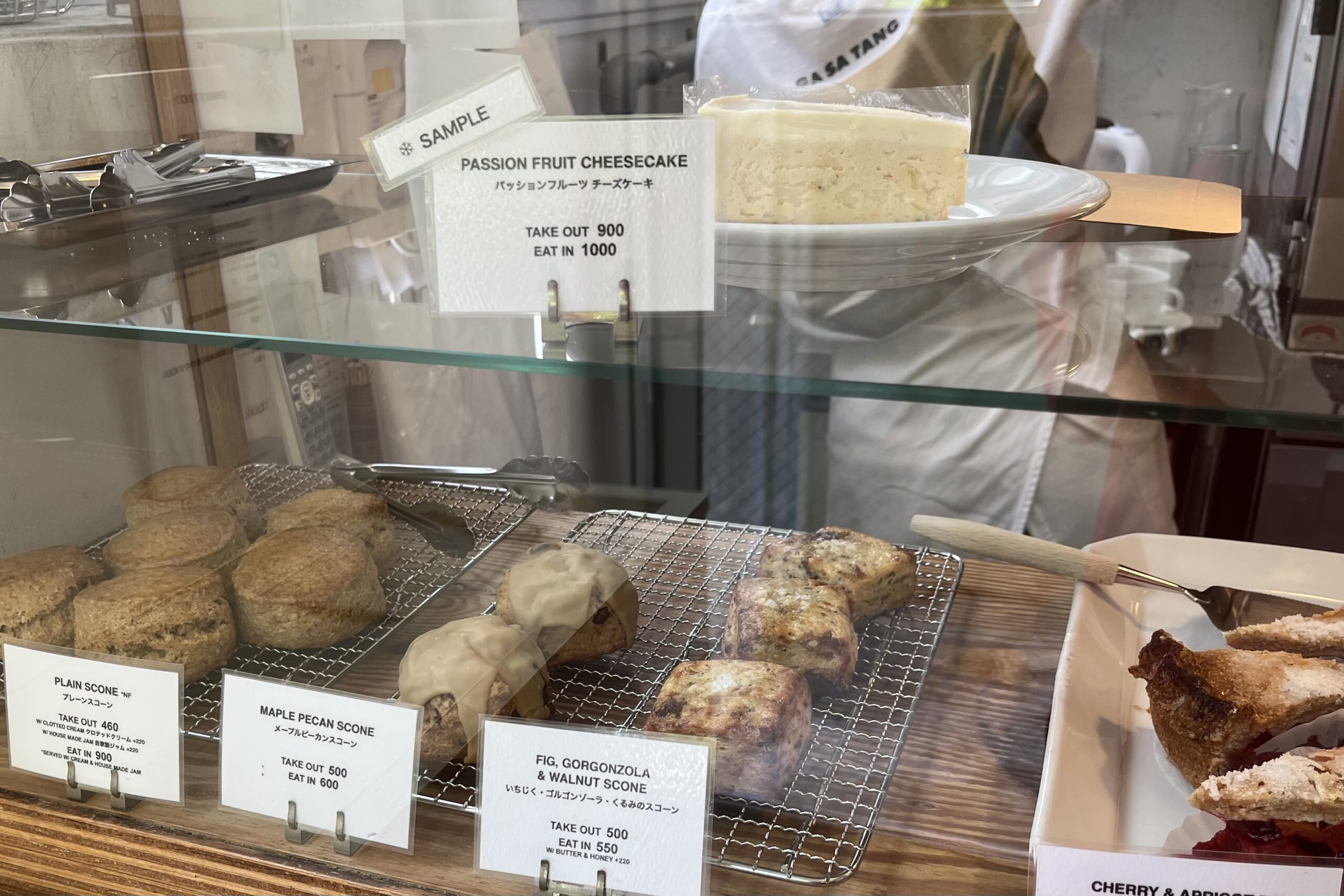 Passion fruit cheesecake and scones in the pastry case at Buik