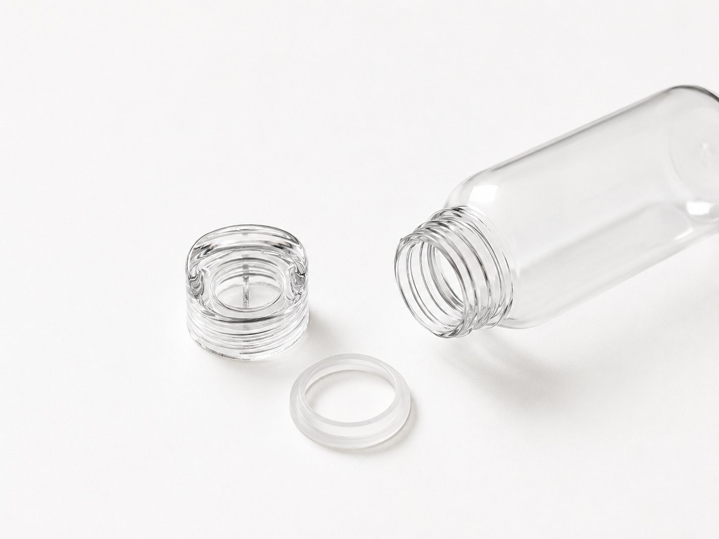 KINTO Water Bottle taken apart: bottle, lid and silicone ring
